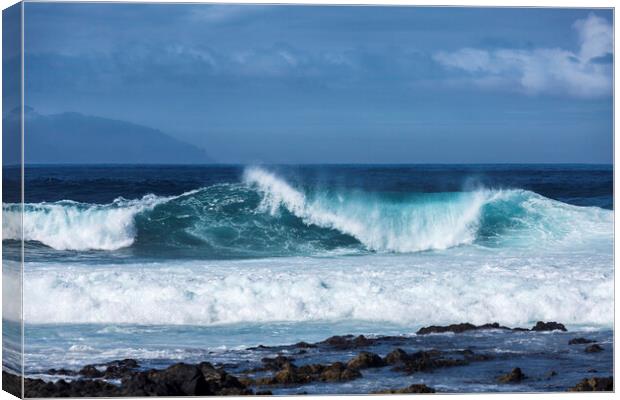 Wave curling over Tenerife Canvas Print by Phil Crean