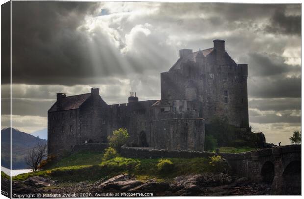 Eilean Donan castle in a burst of sun Canvas Print by Marketa Zvelebil