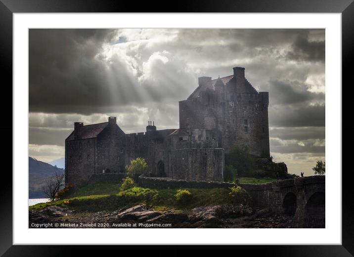 Eilean Donan castle in a burst of sun Framed Mounted Print by Marketa Zvelebil