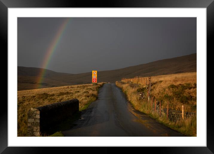 Rainbow over the mountain road Framed Mounted Print by Leighton Collins