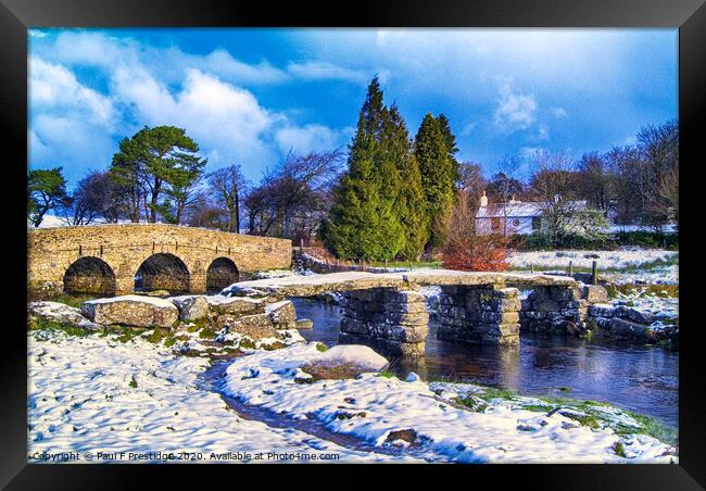 Snowy Medieval Clapper Bridge Framed Print by Paul F Prestidge