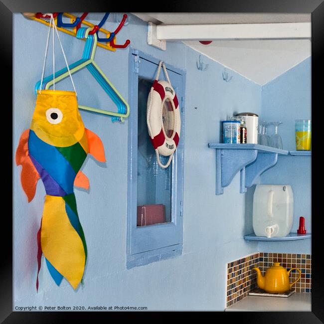 Inside corner of a beach hut. Colourful still life. Framed Print by Peter Bolton