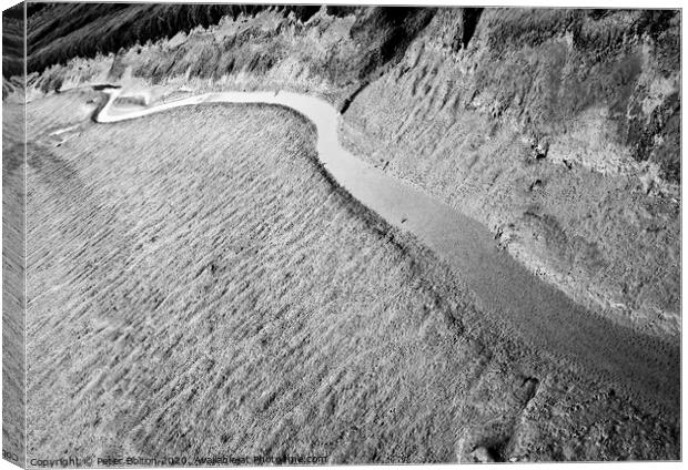 A black and white 'abstract in nature' of a natural tidal drainage channel through the dunes. Canvas Print by Peter Bolton