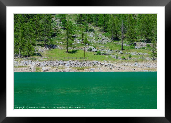 a suggestive green mountain lake  Framed Mounted Print by susanna mattioda
