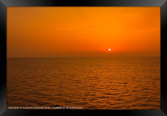 Ibiza seascape. A spectacular sea sunset seen from Framed Print by susanna mattioda