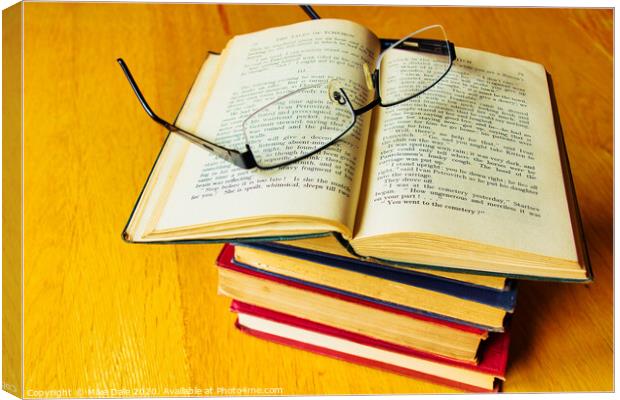 Stack of Antique Books and Spectacles 1 Canvas Print by Mike Dale