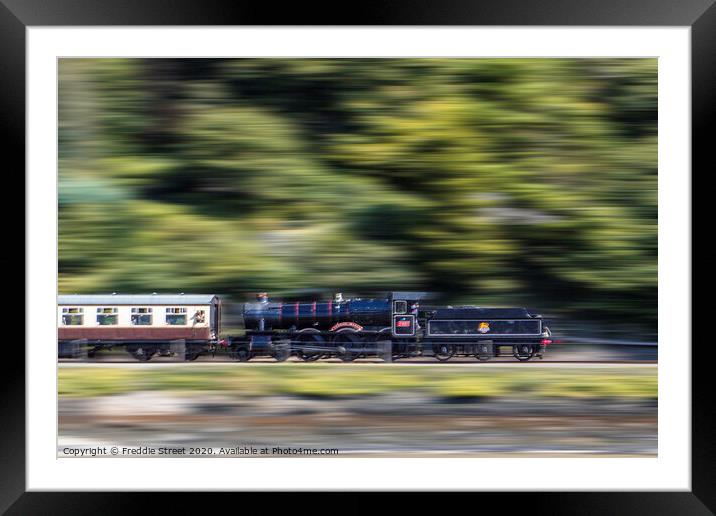 A train in motion  Framed Mounted Print by Freddie Street