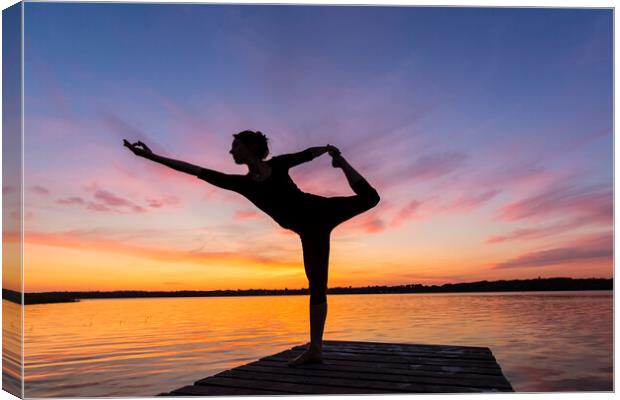 Yoga at Sunset Canvas Print by Arterra 
