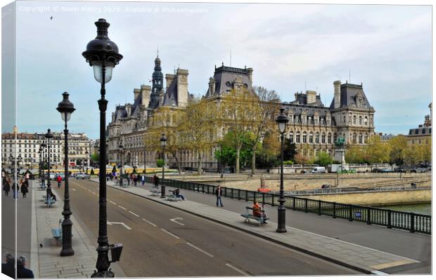 A street scene of Paris with typical Haussmann Buildings Canvas Print by Navin Mistry
