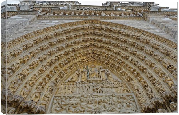The Ornate carved door way of Notre Dame Cathedral, Paris,  Canvas Print by Navin Mistry