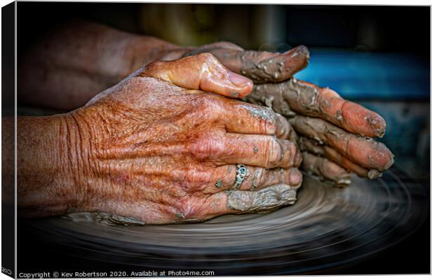 Hands of the Potter Canvas Print by Kev Robertson