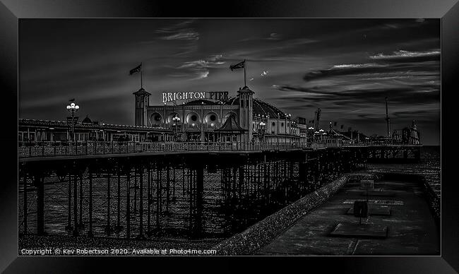 Brighton Pier at night Framed Print by Kev Robertson