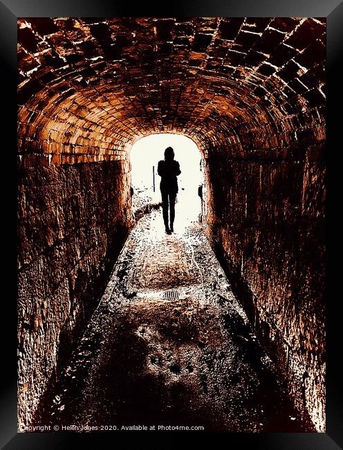 Silhouette at the end of the tunnel Framed Print by Helen Jones