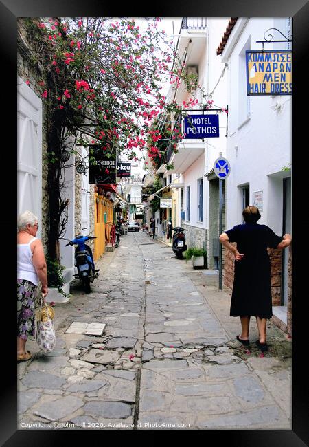 Back street in Skiathos town at Skiathos Island in Greece. Framed Print by john hill