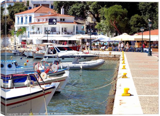 The Old port at Skiathos Town on the Island of Skiathos in Greece. Canvas Print by john hill