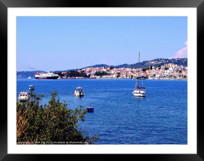 Skiathos town from across the bay on Skiathos Island in Greece. Framed Mounted Print by john hill