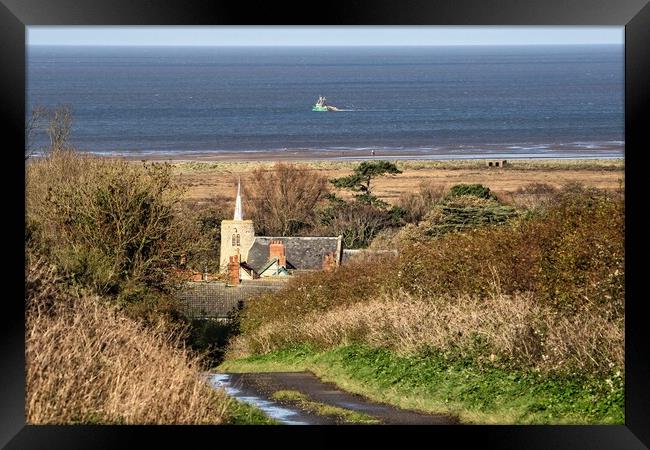 Looking out to sea over St Mary’s Church Framed Print by Gary Pearson