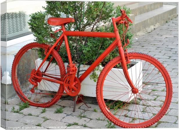 Red bicycle. Canvas Print by john hill