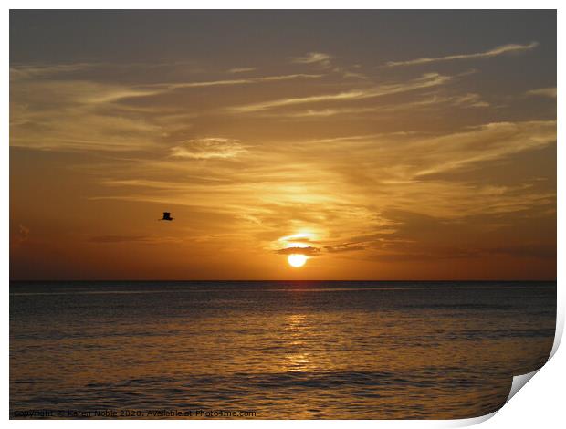 Sunset at sea in Bayahibe in Dominican Republic be Print by Karen Noble