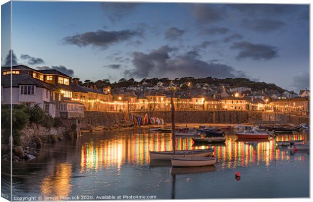 Mousehole harbour reflections at night Canvas Print by Simon Maycock