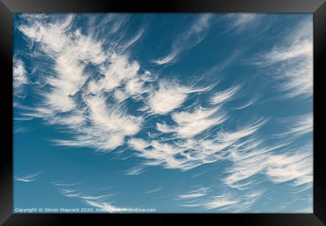 Feathery clouds Framed Print by Simon Maycock