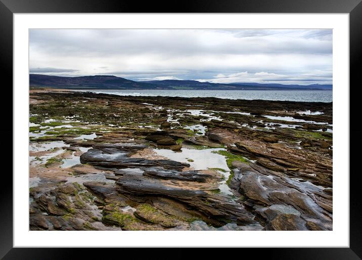 Rocks and Rock pools at Embo beach Scotland Framed Mounted Print by Jacqi Elmslie