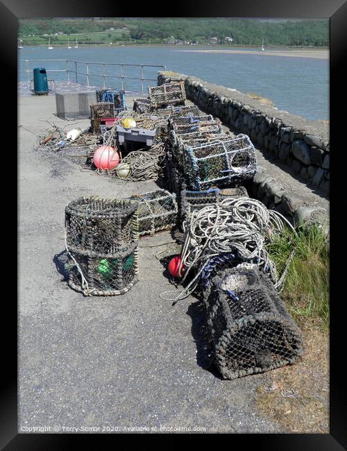 Crab Pots on Shell Island North Wales Framed Print by Terry Senior