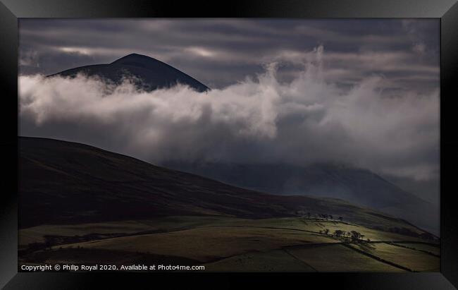 Spotlight on the copse, Skiddaw, Lake District Framed Print by Philip Royal