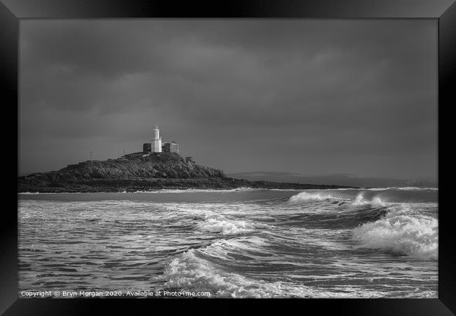 Mumbles lighthouse viewed from Bracelet bay, black and white Framed Print by Bryn Morgan