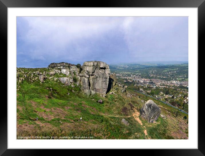 The Cow and Calf rocks and Ilkley town. Framed Mounted Print by Chris North