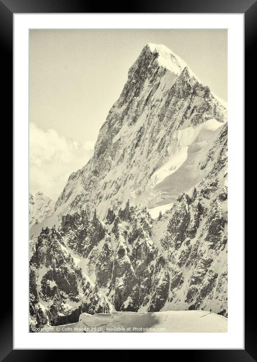 The tiny figure of a climber in front  of the Grandes Jorasses Framed Mounted Print by Colin Woods
