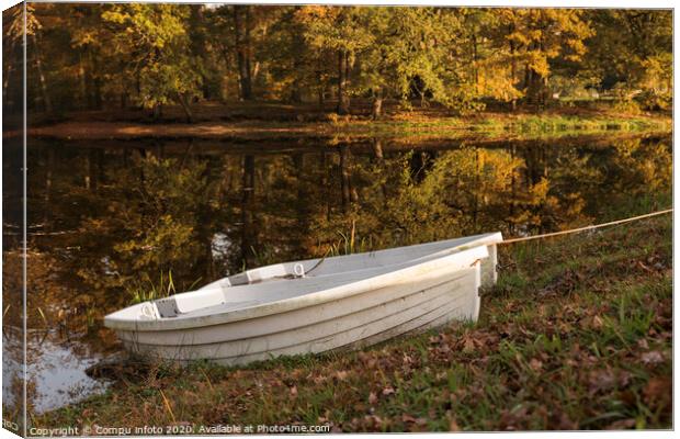 two boats in a pond with autumn colors Canvas Print by Chris Willemsen