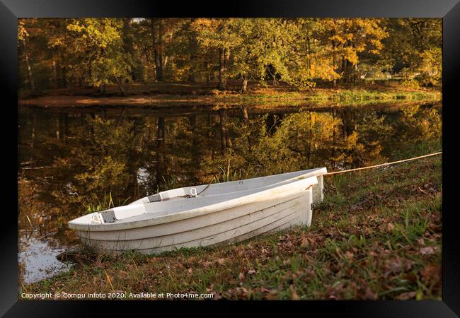 two boats in a pond with autumn colors Framed Print by Chris Willemsen