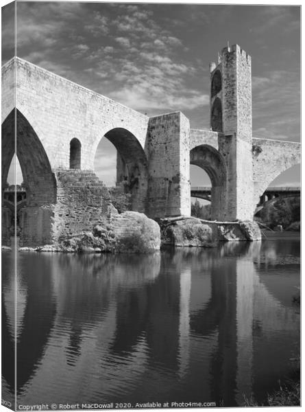 11th century bridge at Besalu, Spain Canvas Print by Robert MacDowall