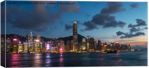 Hong kong skyline at dusk Canvas Print by Jo Sowden