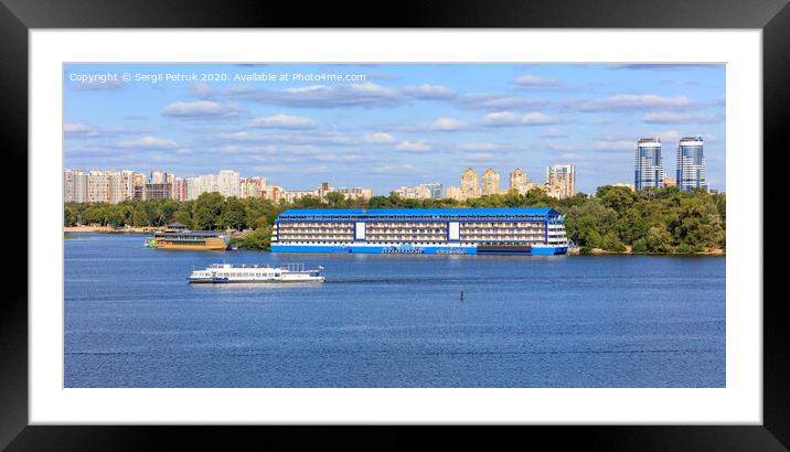 Landscape: pleasure ships go along the Dnipro River against the background of residential areas of Kyiv on the banks in bright sunlight. Framed Mounted Print by Sergii Petruk
