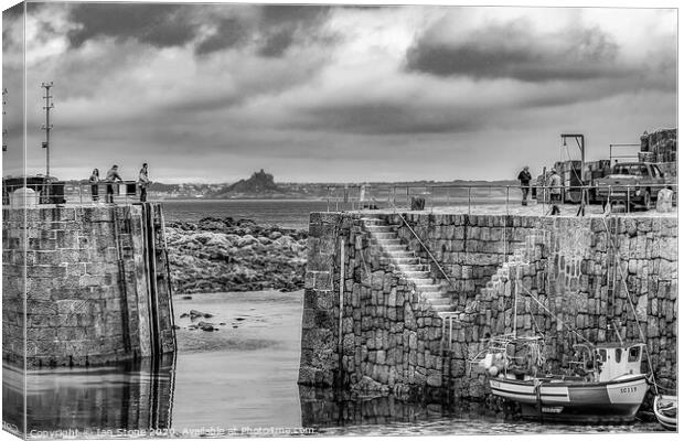 Mousehole Harbour in Cornwall  Canvas Print by Ian Stone