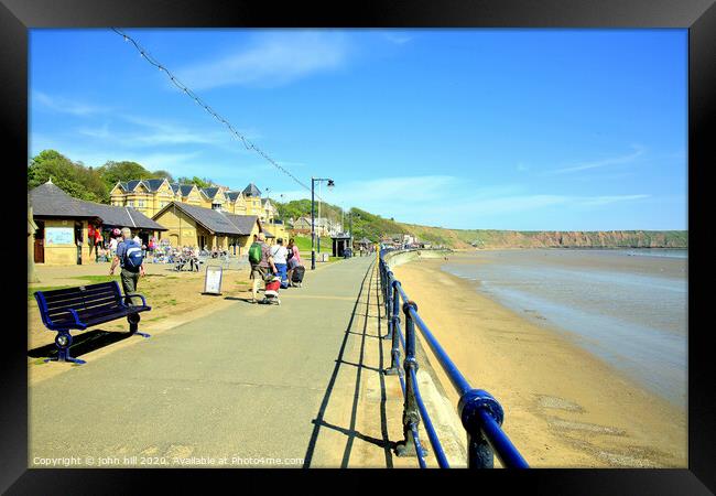 Promenade looking towards the Brigg at Filey in Yorkshire. Framed Print by john hill