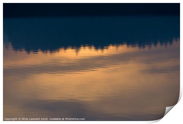 Reflection of sunset colors over trees in calm rippled water Print by Rhys Leonard