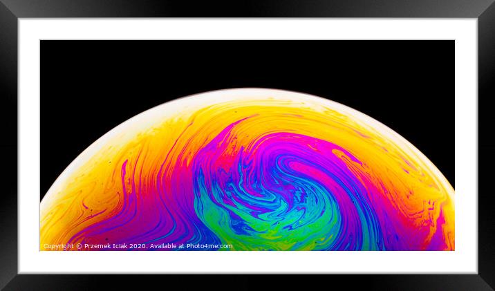 Rainbow soap bubble on a dark background. Close-up of colorful surface. Framed Mounted Print by Przemek Iciak