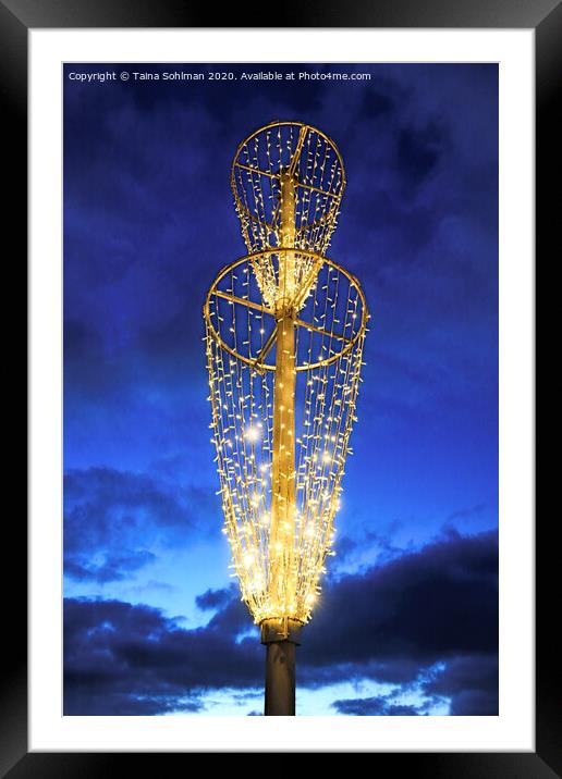 Christmas Lights against Morning Sky Framed Mounted Print by Taina Sohlman