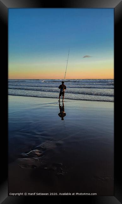 Fisherman beach sunset 2 Framed Print by Hanif Setiawan