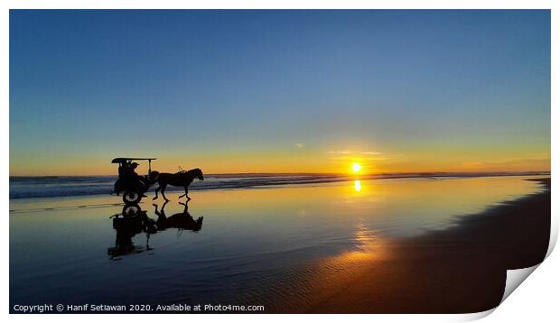 Silhouetted horse-drawn carriage beach sunset 1 Print by Hanif Setiawan