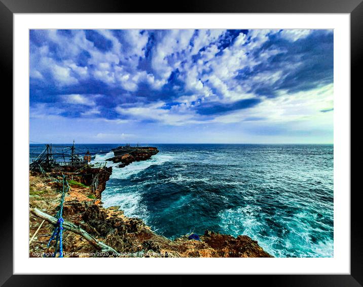 A rock plateau and a rock island in the sea 7 Framed Mounted Print by Hanif Setiawan