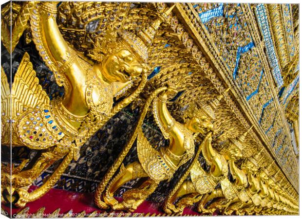 Golden statuettes and detail on the Temple of the Emerald Buddha in the grounds of the Grand Palace - Wat Phra Kaew, Thailand, Bangkok Canvas Print by Mehul Patel