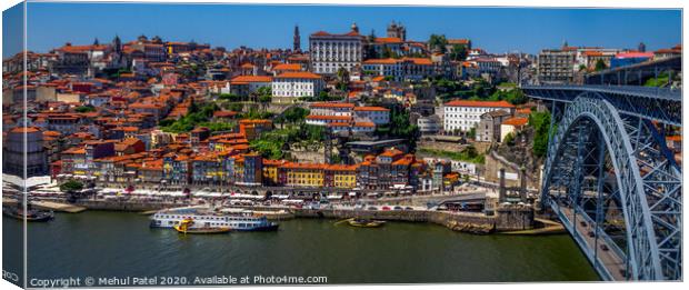 Embankment of the river Duoro by the old town of Porto, Portugal Canvas Print by Mehul Patel