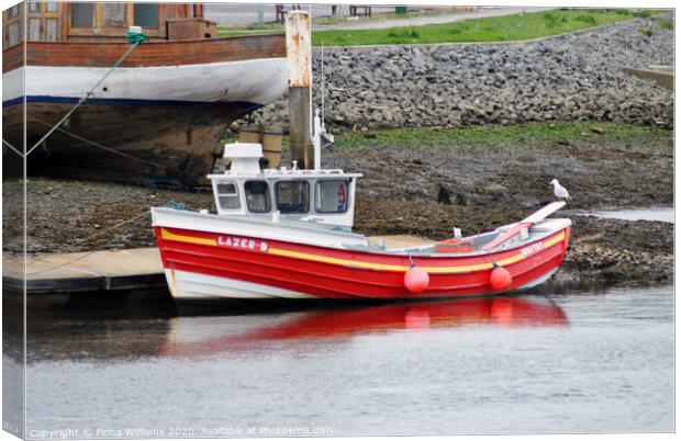 Orange boat at Whitby harbour Canvas Print by Fiona Williams