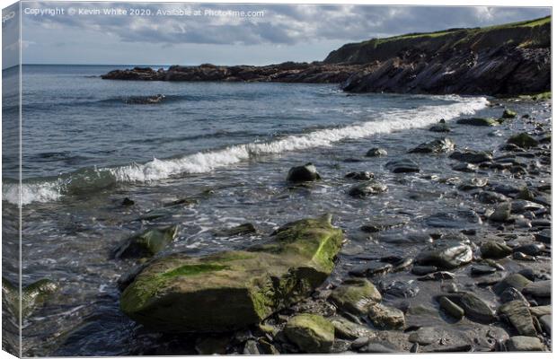 Rocky beach near St Mawes Cornwall Canvas Print by Kevin White