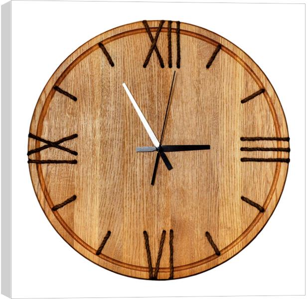 Beautiful wooden wall clock made of light wood and twine, isolate on white background. Canvas Print by Sergii Petruk
