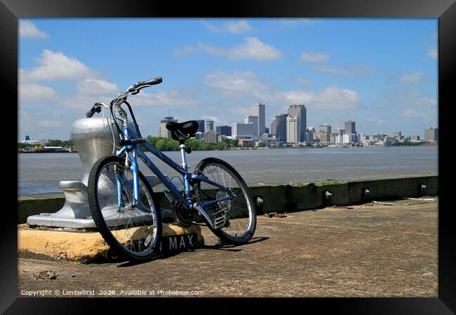 Bicycle leaning at the pier near New Orleans Framed Print by Lensw0rld 